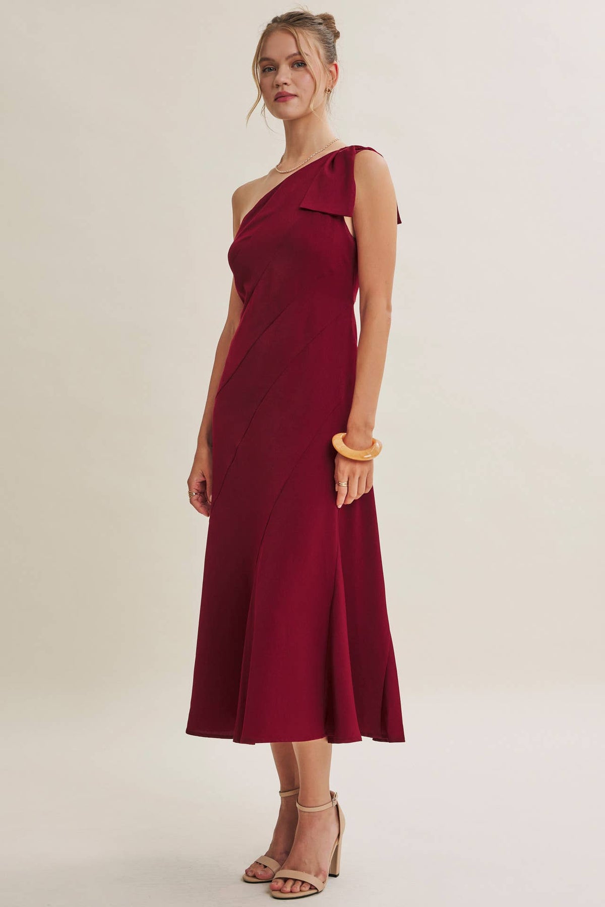 PARTY GLAM ONE-SHOULDER BOW MIDI DRESS W/ SCULPTING SEAM